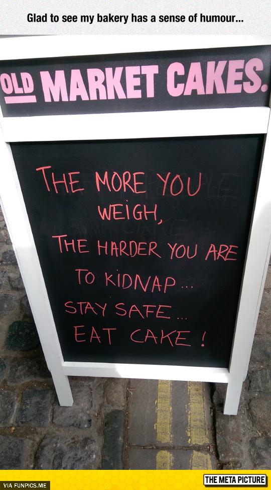 Funny bakery cake sign