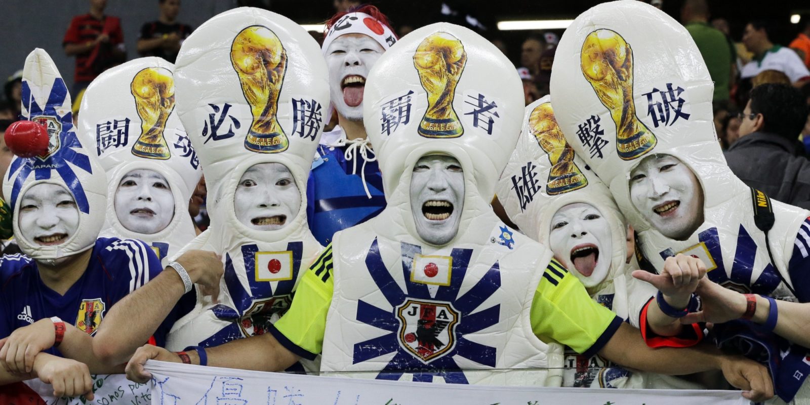 Japanese supporters react before the start of  the group C World Cup soccer match between Ivory Coast and Japan at the Arena Pernambuco in Recife, Brazil, Saturday, June 14, 2014.    (AP Photo/Shuji Kajiyama)