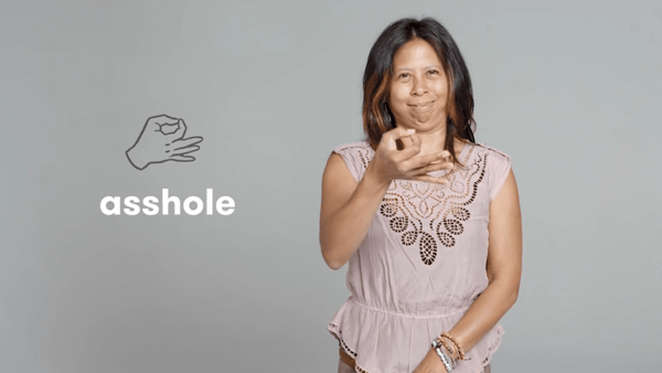 how to say asshole in sign language