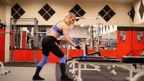 Women muscle workout in gym